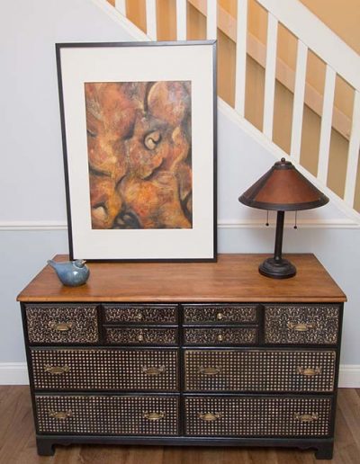 Black and gold dresser